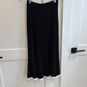 Elegant Black Pleated Skirt with White Trim